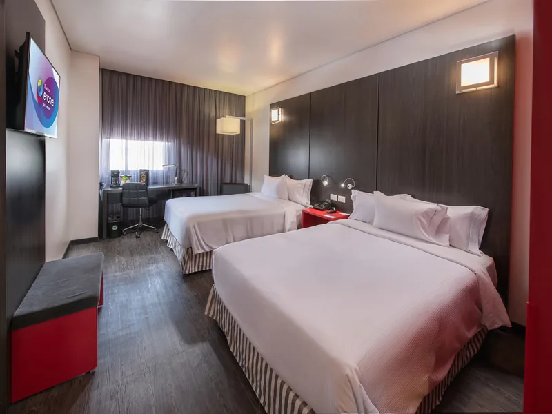 Habitación del hotel — Hotel Ramada Encore by Wyndham Guadalajara Sur