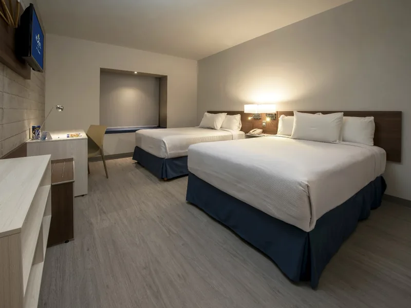 Habitación del hotel — Hotel Microtel Inn & Suites Guadalajara Sur